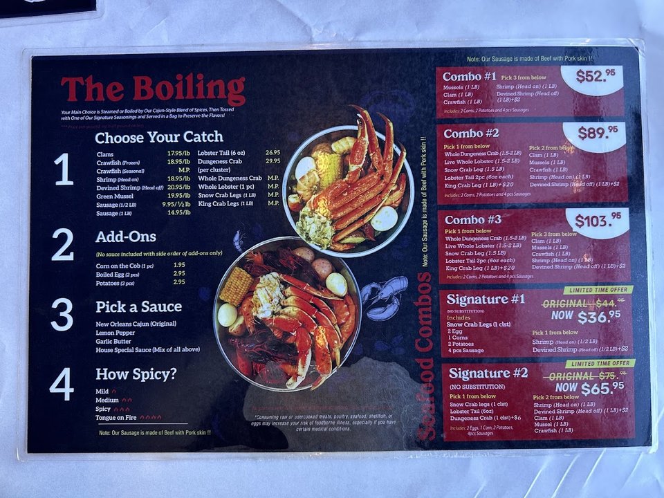 Cajun plates with crab, shrimp, and sides.