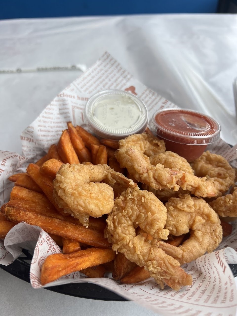 Seafood restaurant menu with Cajun-style selections.