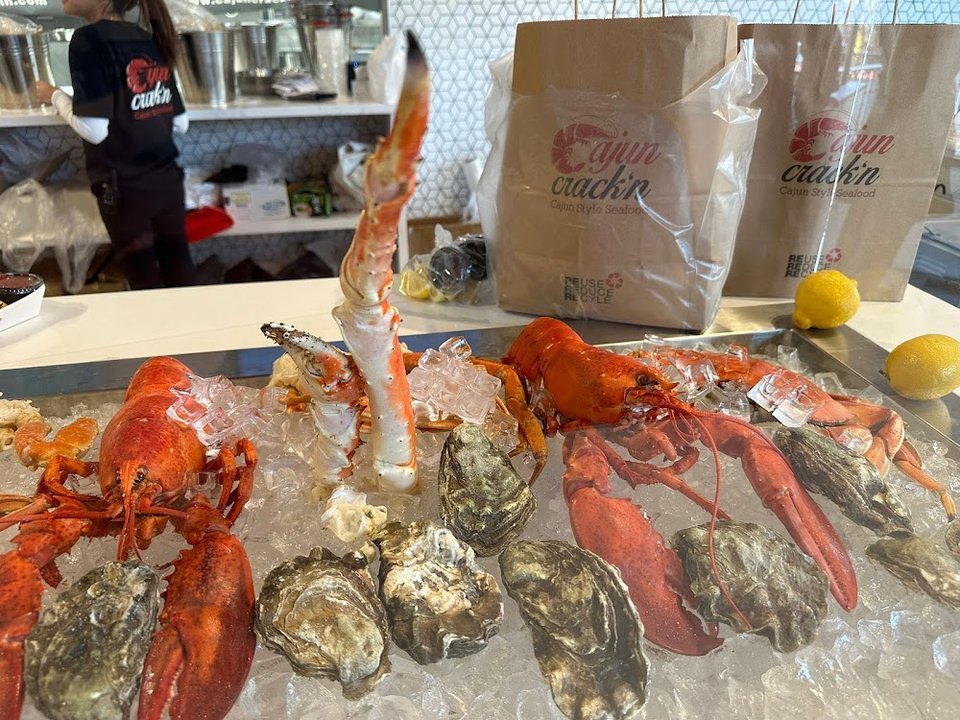 Seafood restaurant menu with Cajun-style selections.