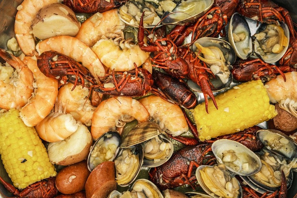 Seafood restaurant menu with Cajun-style selections.